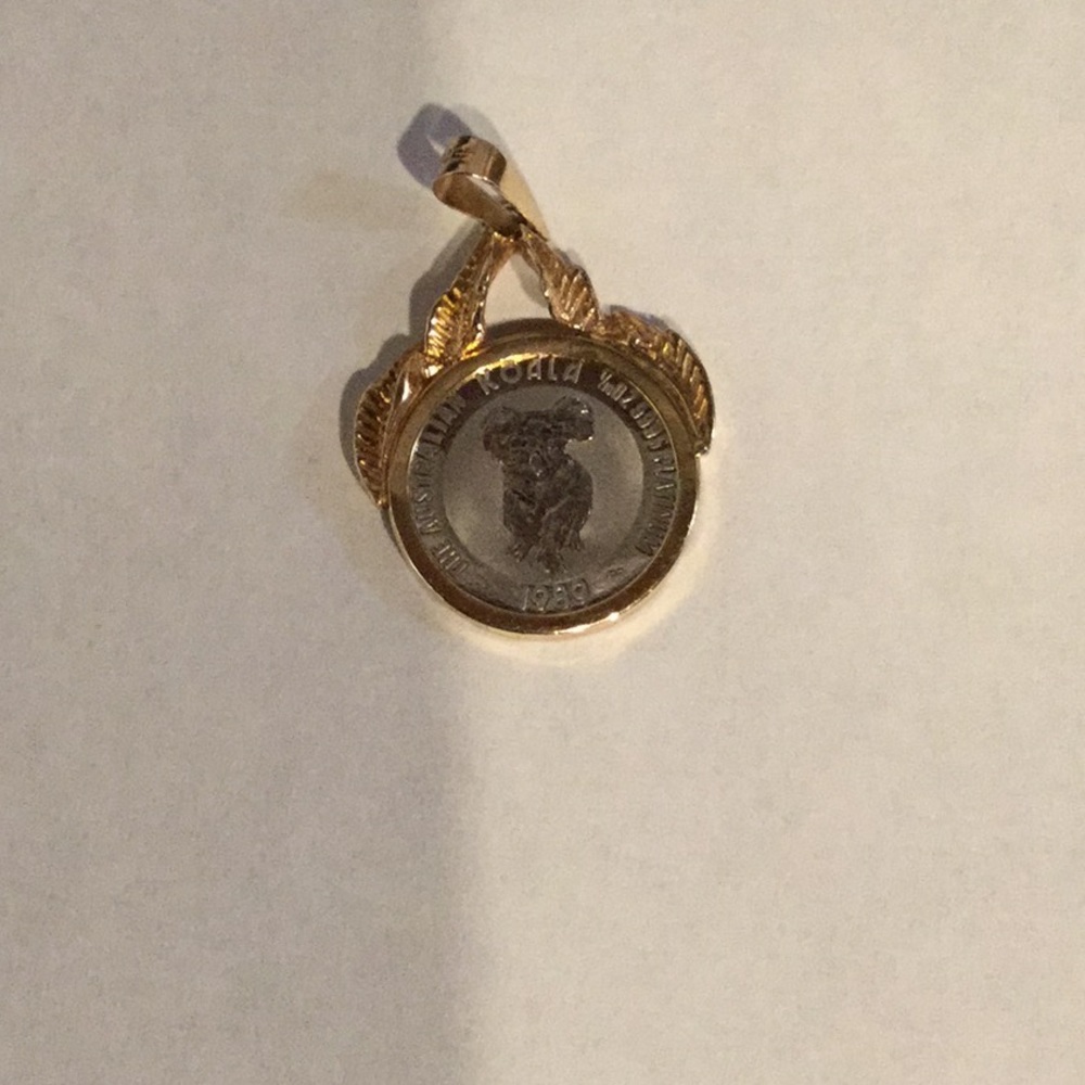 Platinum coin 1/10 ounce 14K yellow pendant
